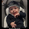 Ayan a rejoint le concours — aidez-le/la à gagner de superbes lots ! apparel, baby, child, clothing, cozy, cushion, cute, expression, happy, hat, headwear, indoor, infant, person, portrait, seat, sitting, smiling, warm, young