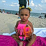 toddler, child, beach, sand, ocean, snorkel_mask, pink_bikini, hair_bows, blanket, sunny, sky, clouds, people, water, summer, vacation, sand_on_skin, swimwear, outdoor, portrait
