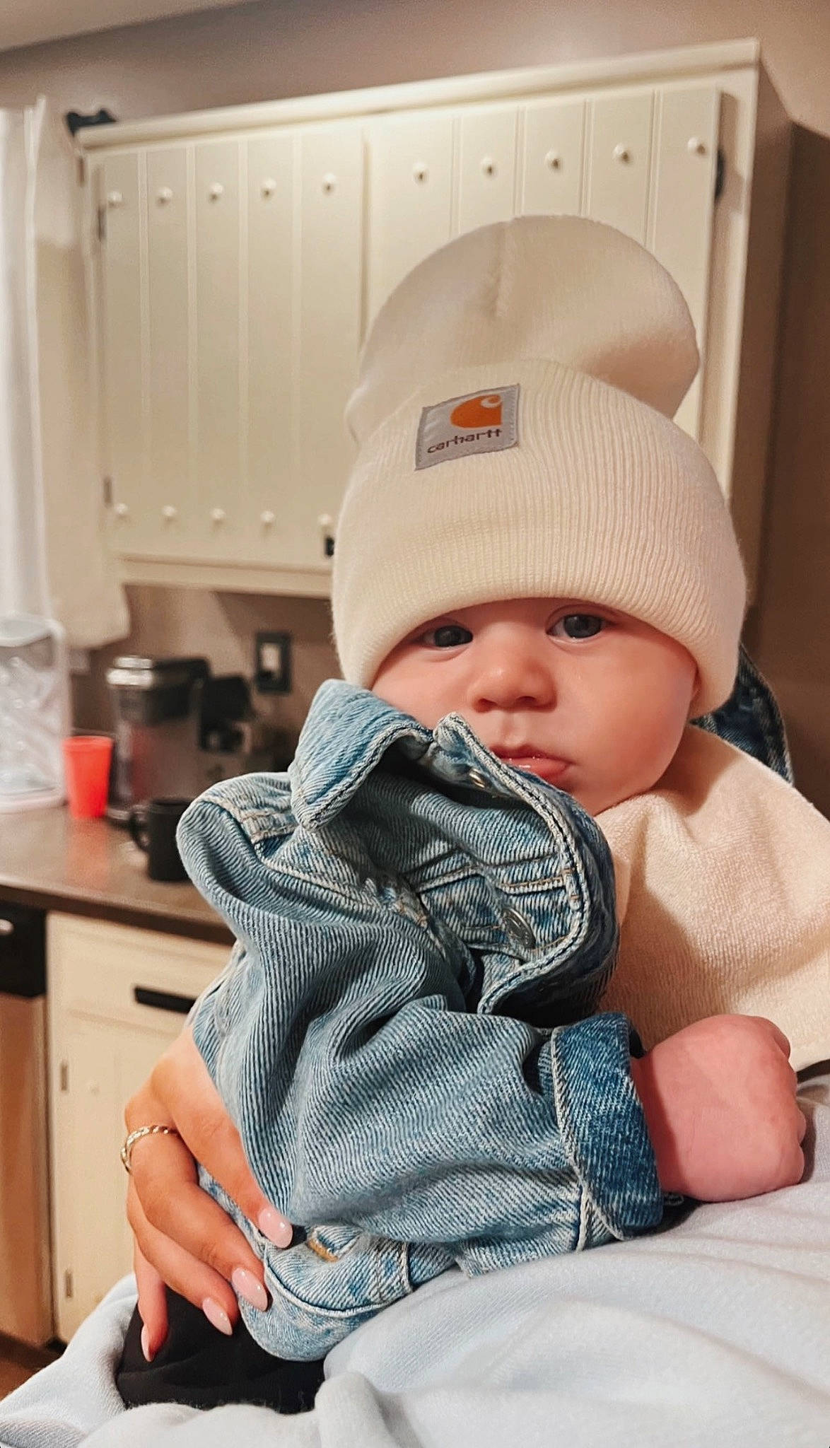 Noah joined the competition — help win amazing prizes! baby, baby_toddler_clothing, beanie, cabinetry, cap, comfort, cupboard, drawer, electric_blue, eye, fashion_accessory, headgear, headwear, kitchen_appliance, knit_cap, pattern, person, room, sitting, thumb