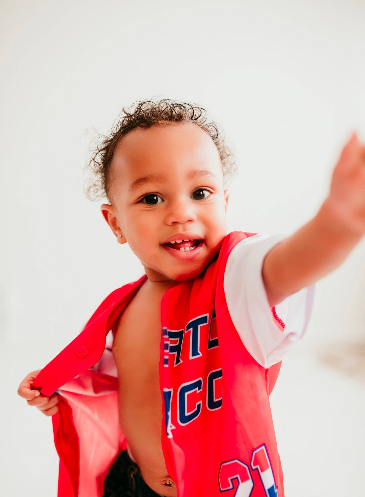 Carisi joined the competition — help win amazing prizes! baby_toddler_clothing, carmine, chest, child, elbow, face, fashion_accessory, fashion_design, gesture, happy, jersey, jewellery, joy, neck, person, sleeve, sleeveless_shirt, smile, sportswear, t_shirt