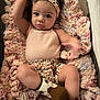 Truee joined the competition — help win amazing prizes! baby, infant, blanket, headband, floral, clothing, booties, cute, face, person, child, soft, texture, pattern, lying, indoors, portrait, expressive, adorable, cozy