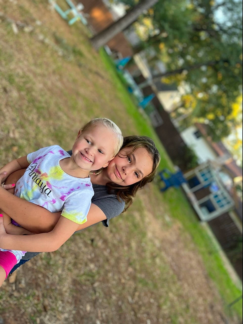 Eliza is registered to the contest to win money with this photo: baby, eyewear, flash_photography, fun, grass, happy, joy, laugh, leisure, people_in_nature, person, plant, play, portrait_photography, recreation, running, shorts, sitting, smile, t_shirt