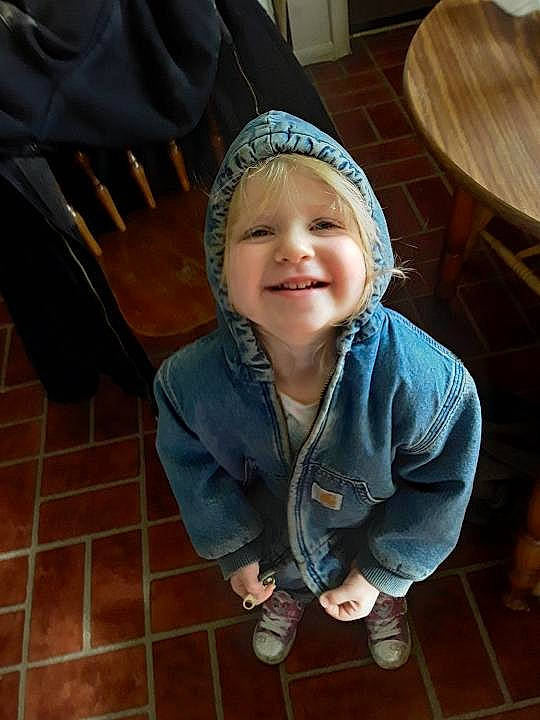 Elena joined the competition — help win amazing prizes! cheek, child, cool, facial_expression, fun, headgear, headwear, joy, laugh, person, sitting, smile, toddler, wood