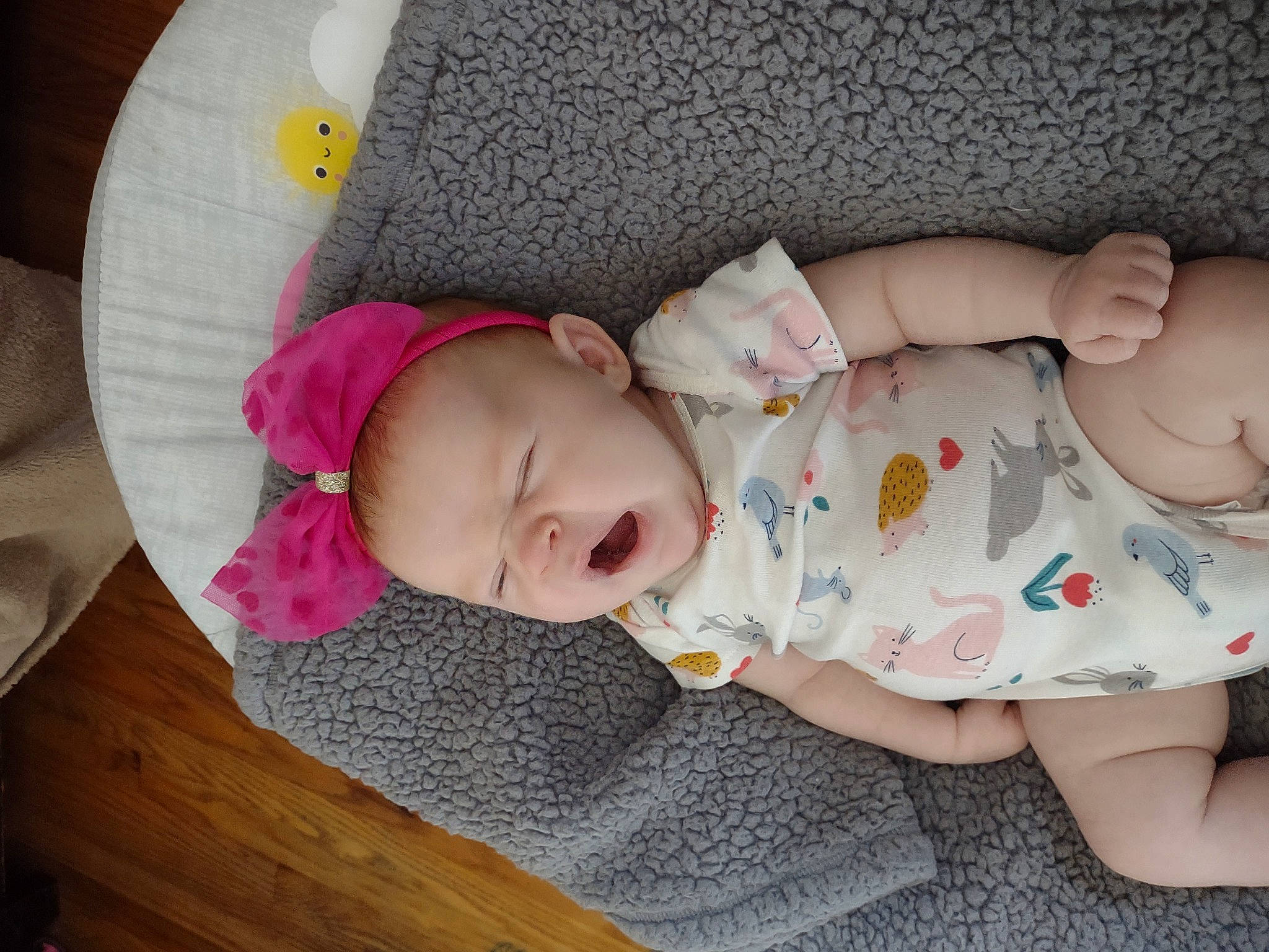 Lorelai is registered to the contest to win money with this photo: baby, baby_products, baby_sleeping, baby_toddler_clothing, cheek, child, comfort, headgear, linens, nap, organ, pattern, person, pink, room, sitting, skin, sleep, sleeve, toddler