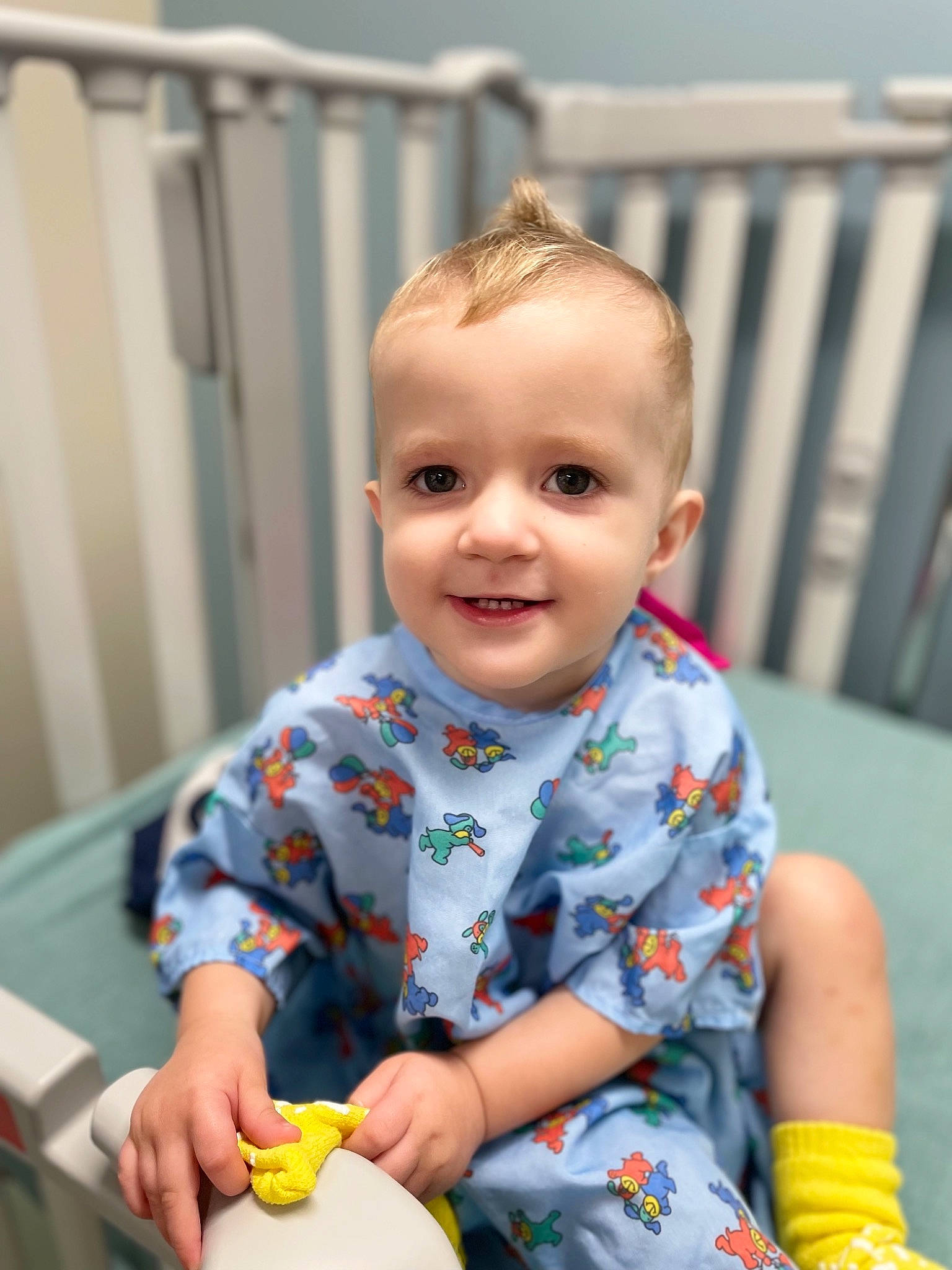 Johncarter is registered to the contest to win money with this photo: baby, baby_playing_with_toys, baby_toddler_clothing, cheek, child, dress, face, fun, happy, iris, joy, leisure, pattern, person, sitting, skin, sleeve, smile, standing, t_shirt