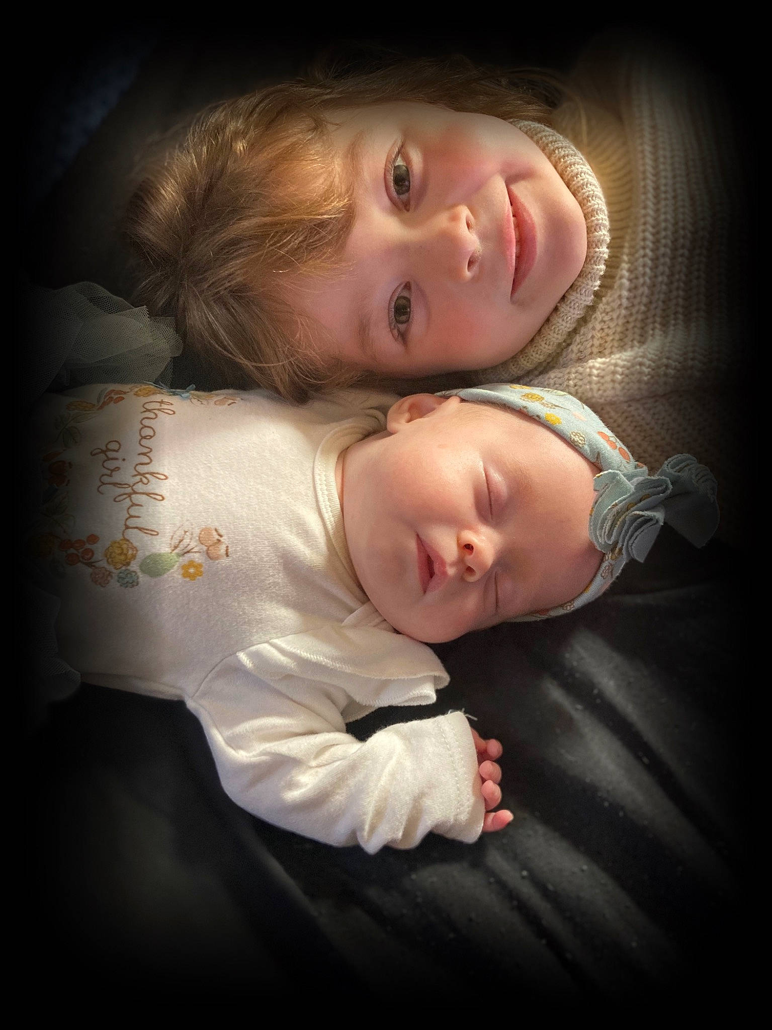 Cheyenne is registered to the contest to win money with this photo: baby, baby_toddler_clothing, cheek, child, comfort, darkness, eyebrow, eyelash, flash_photography, fun, gesture, happy, joy, lip, nose, person, portrait, portrait_photography, skin, sleeve