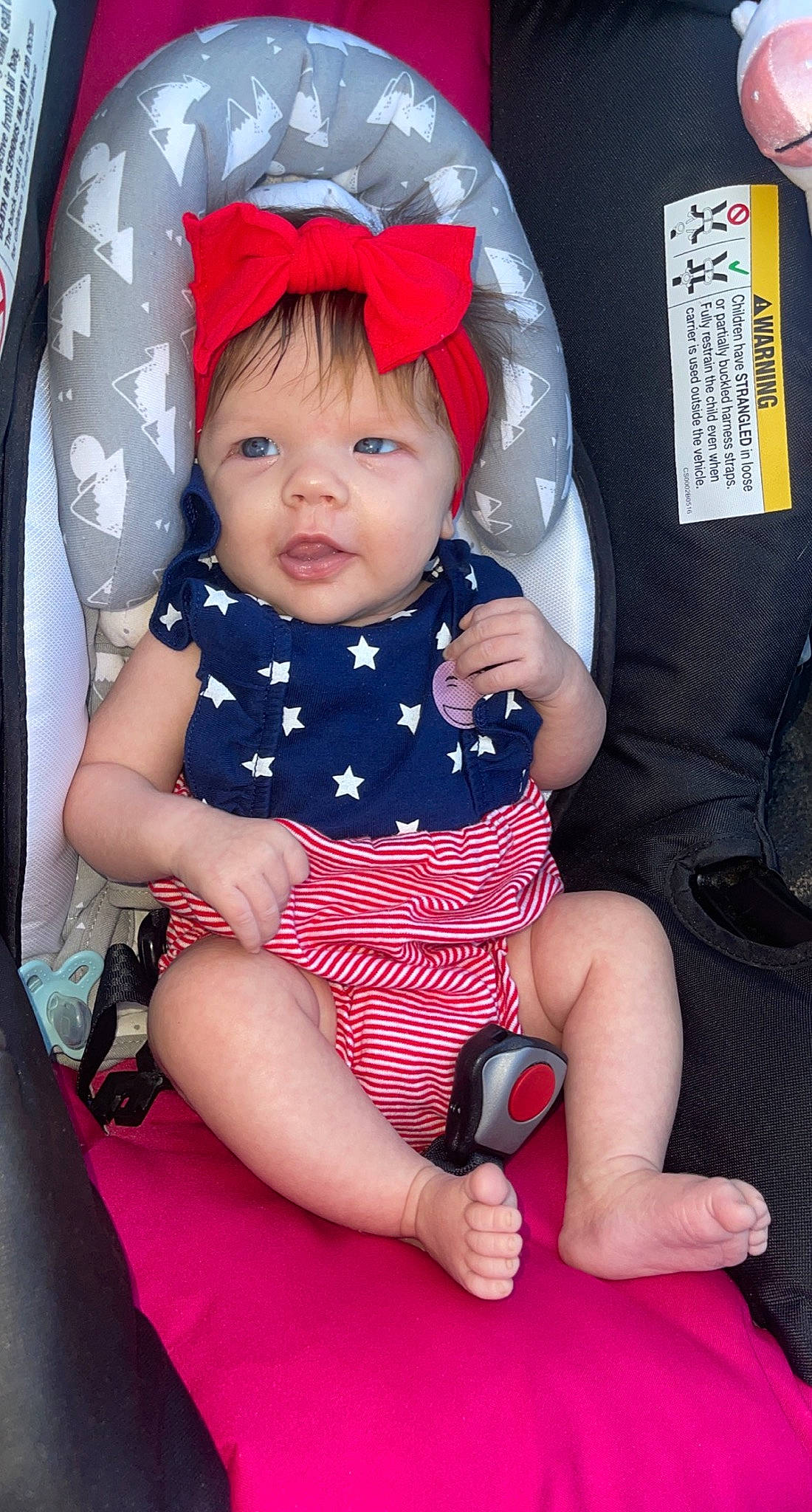 Taytum joined the competition — help win amazing prizes! baby, baby_carriage, baby_toddler_clothing, chair, cheek, comfort, cool, dress, face, facial_expression, fashion, finger, lap, person, pink, purple, red, skin, sleeve, thigh