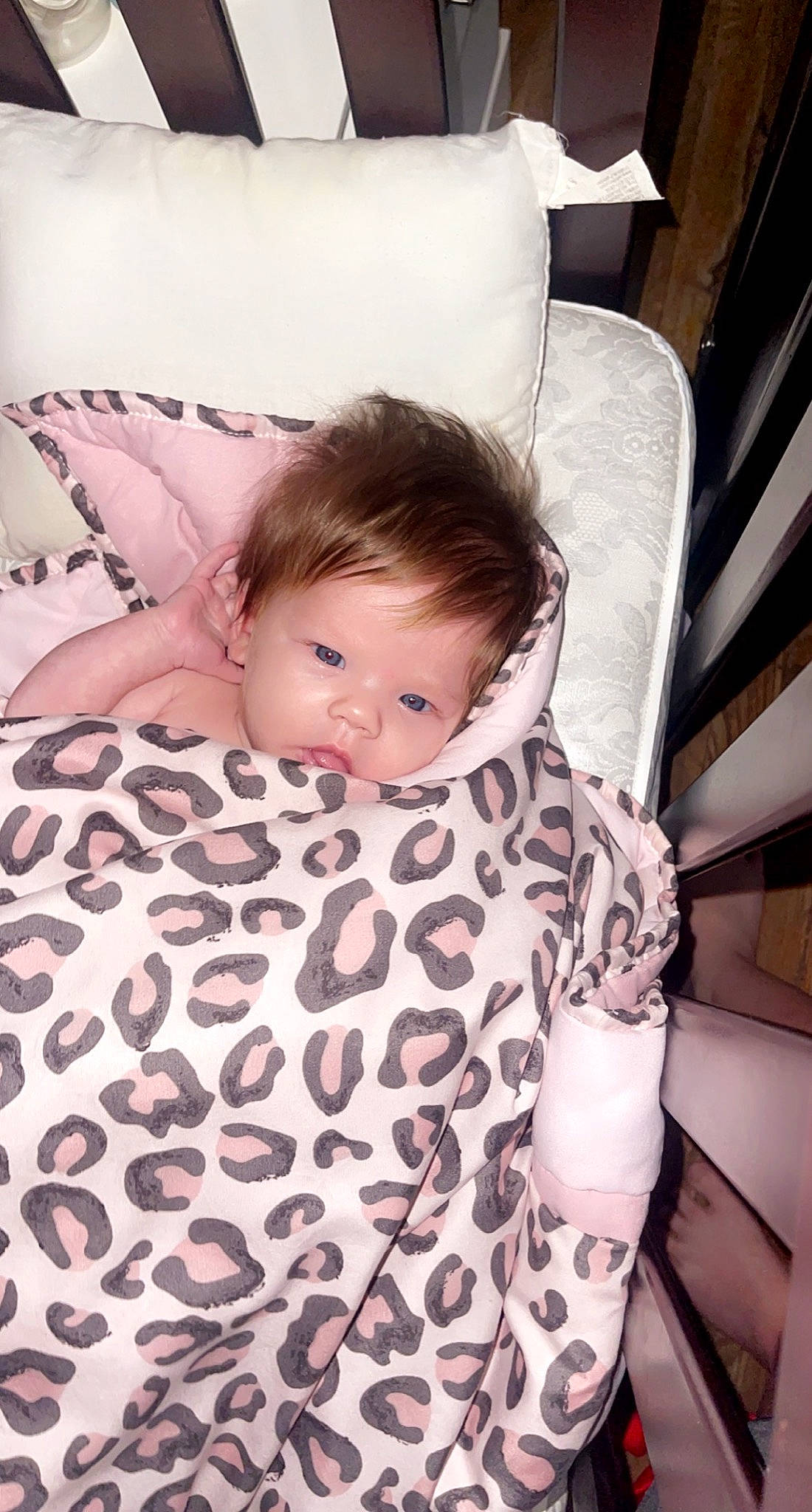 Taytum joined the competition — help win amazing prizes! baby, baby_toddler_clothing, bedding, chair, child, comfort, couch, flooring, fur, linens, pattern, person, room, sitting, sleeve, toddler, white, wood