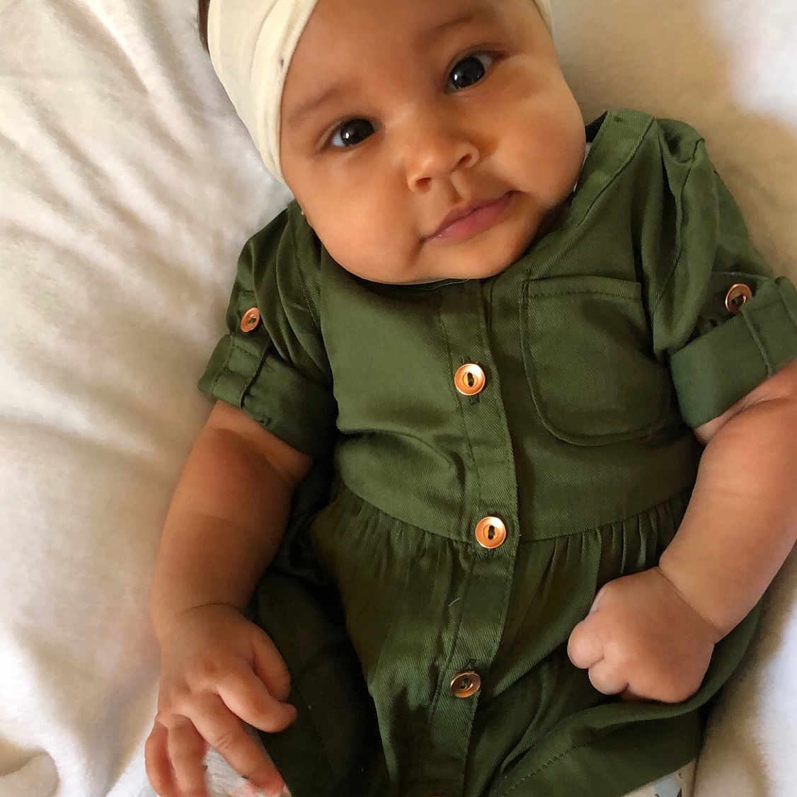 Stormee joined the competition — help win amazing prizes! baby_products, child, girl, green, headgear, infant, person, product, skin, smile, textile, toddler