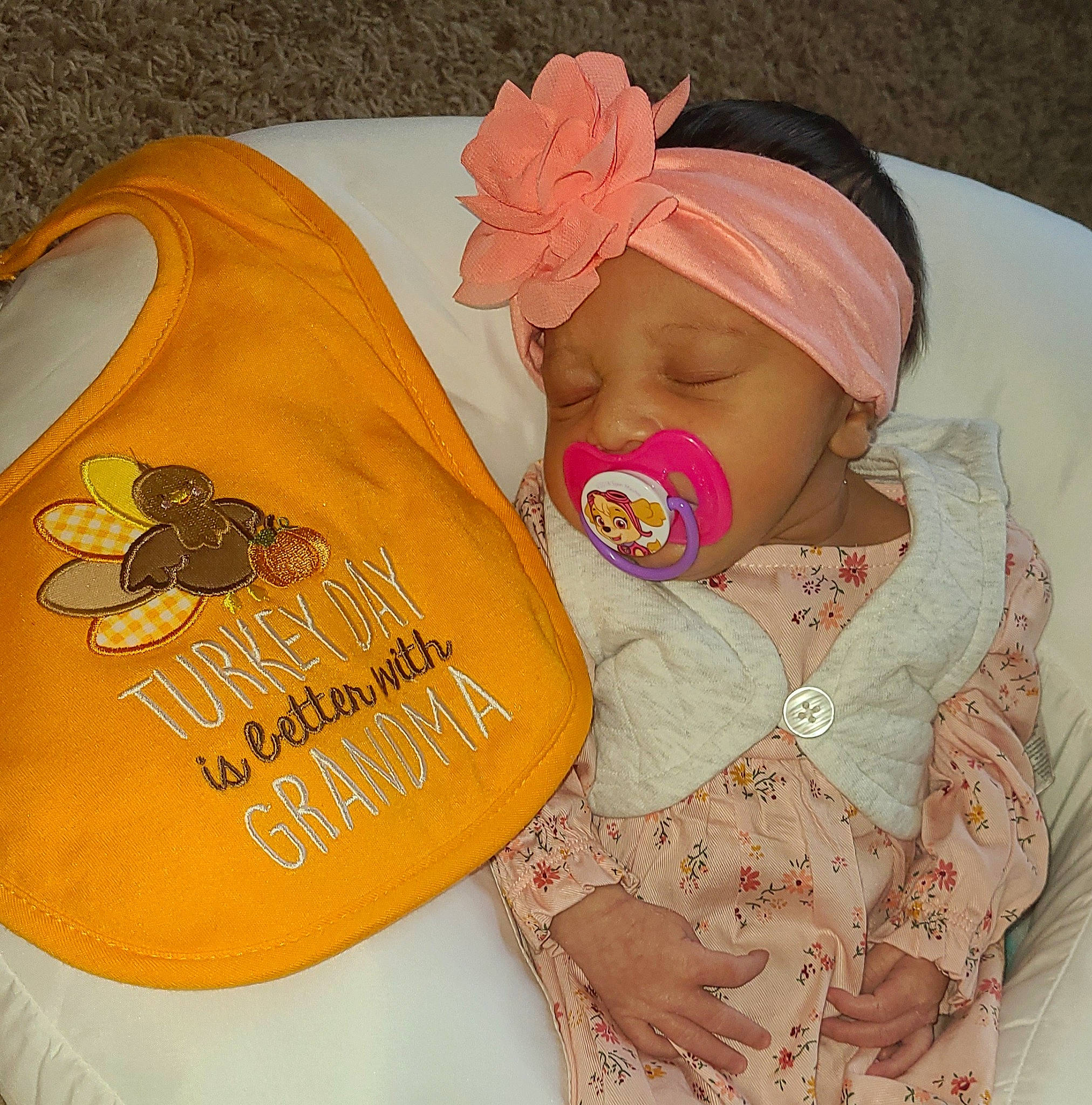 Emmilia is registered to the contest to win money with this photo: baby, baby_products, baby_sleeping, baby_toddler_clothing, bag, cap, cheek, child, comfort, font, happy, headgear, linens, outerwear, pattern, peach, person, product, sleeve, textile