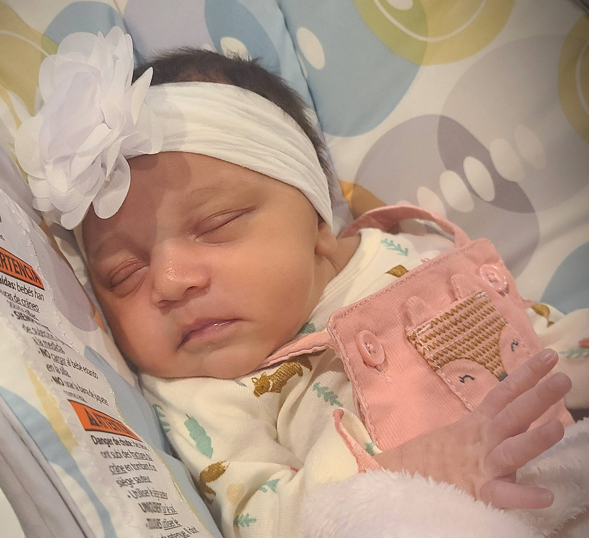 Emmilia is registered to the contest to win money with this photo: baby, baby_sleeping, baby_toddler_clothing, bedtime, cheek, child, chin, comfort, eyelash, facial_expression, happy, headgear, headwear, linens, lip, nose, pattern, peach, person, skin