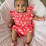 Zoey is registered to the contest to win money with this photo: baby, child, infant, smiling, portrait, floral_outfit, pink_blanket, coral_clothing, sitting, lying_down, indoor, face, eyes, hair, arms, legs, feet, baby_fashion, soft_blanket, photography