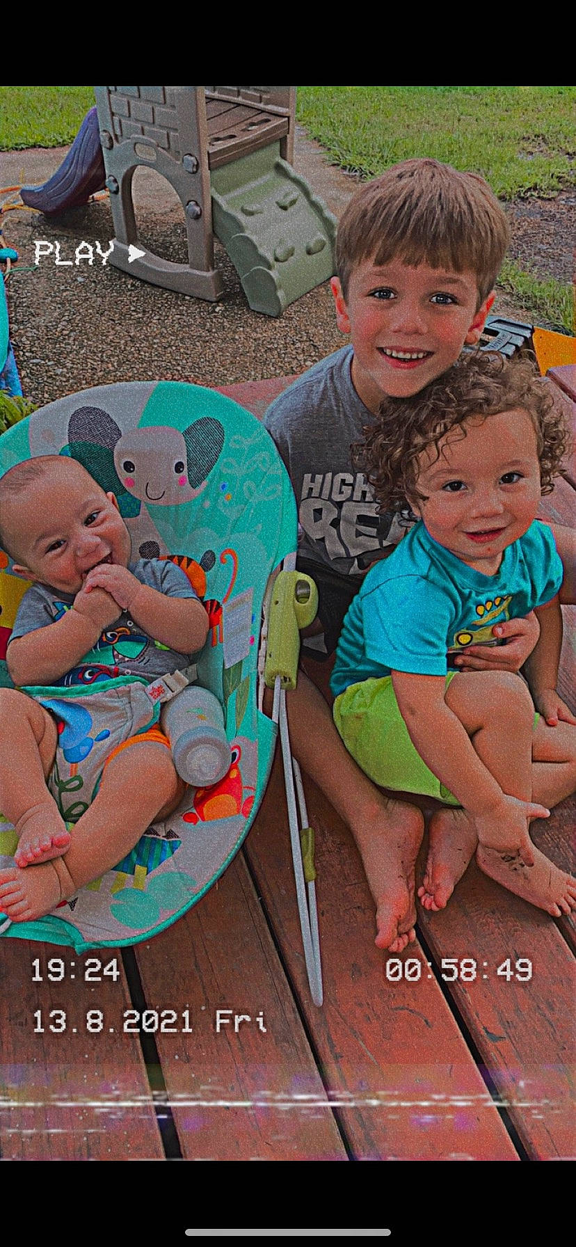 Paxton joined the competition — help win amazing prizes! baby_toddler_clothing, chair, child, grass, green, happy, joy, lap, leg, leisure, people, person, product, recreation, sharing, shorts, sitting, smile, t_shirt, thigh