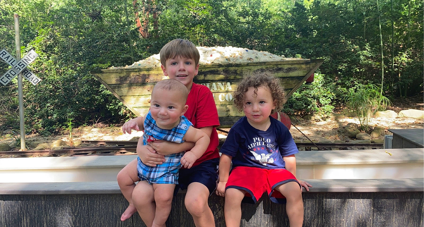 Benson is registered to the contest to win money with this photo: baby_toddler_clothing, child, event, fun, garden, grass, happy, joy, leisure, people, person, plant, recreation, shorts, sitting, skin, smile, t_shirt, thigh, toddler