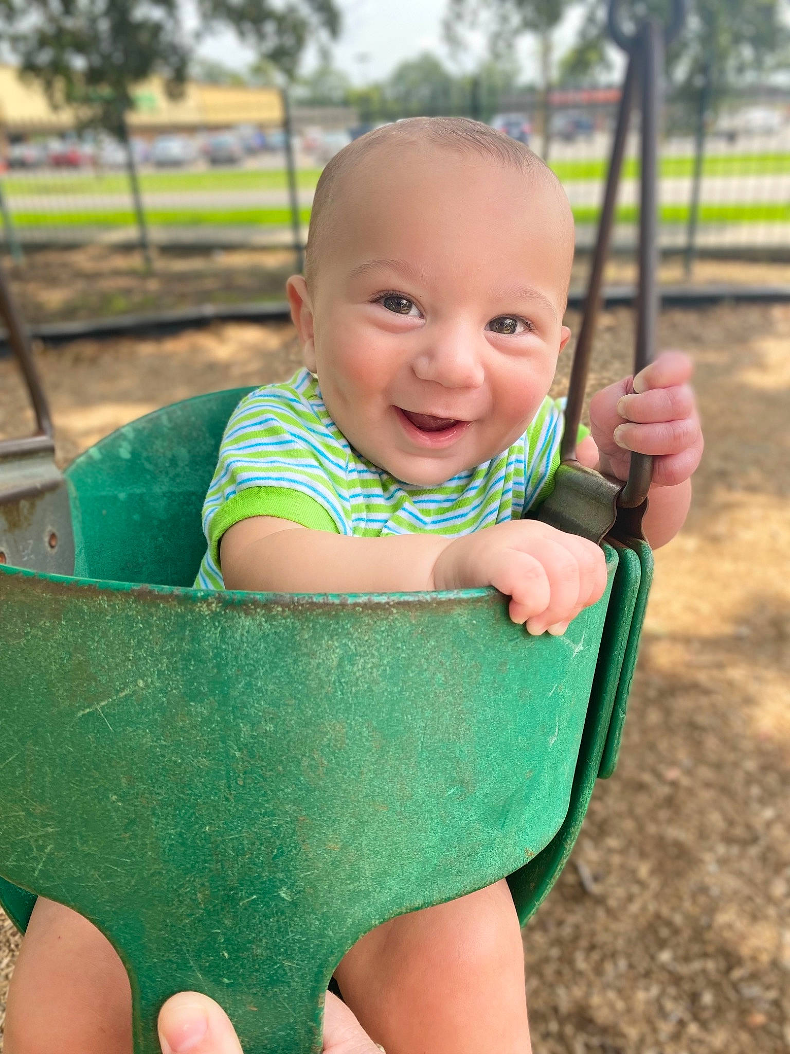 Benson joined the competition — help win amazing prizes! baby, baby_toddler_clothing, child, face, facial_expression, fun, grass, happy, head, leisure, outdoor_play_equipment, people_in_nature, person, playground, public_space, recreation, skin, smile, swing, toddler