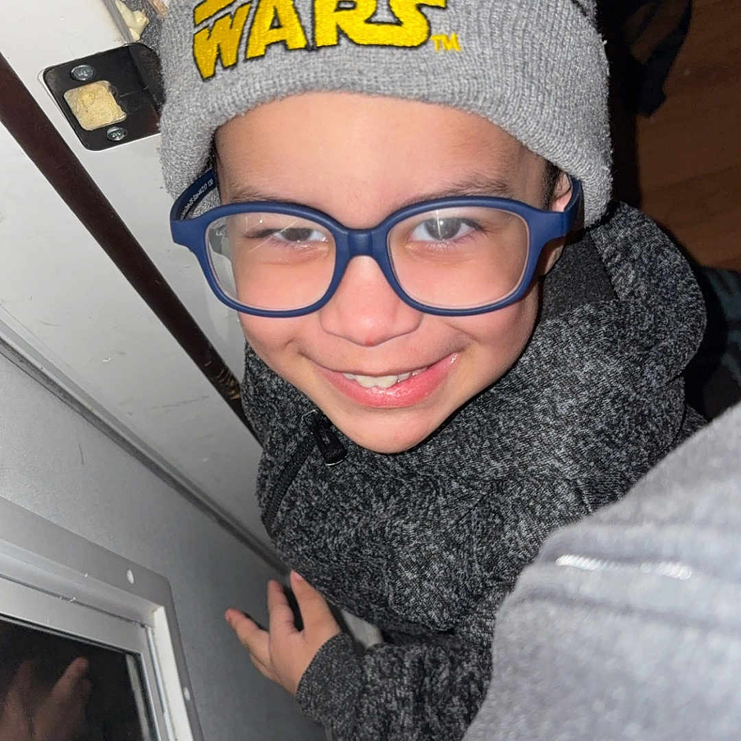 Jr Love joined the competition — help win amazing prizes! accessories, adult, baby, beanie, bonnet, cap, clothing, coat, door, face, glasses, hat, head, jacket, male, man, person, photography, portrait, selfie