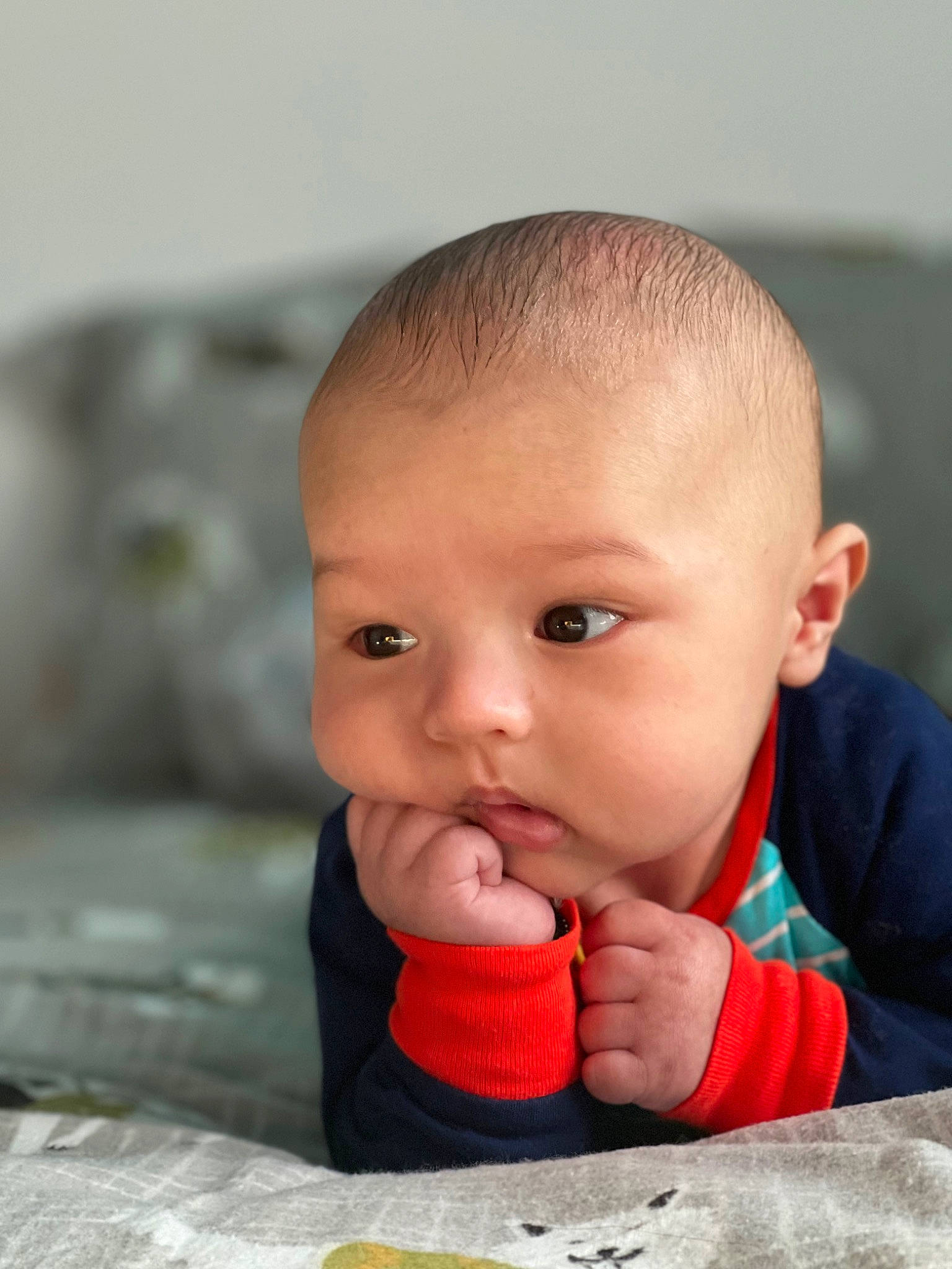 Ivan joined the competition — help win amazing prizes! baby, baby_playing_with_toys, biting, cheek, child, chin, eyelash, facial_expression, finger, fun, hairstyle, happy, lip, mouth, nail, nose, person, skin, thumb, toddler