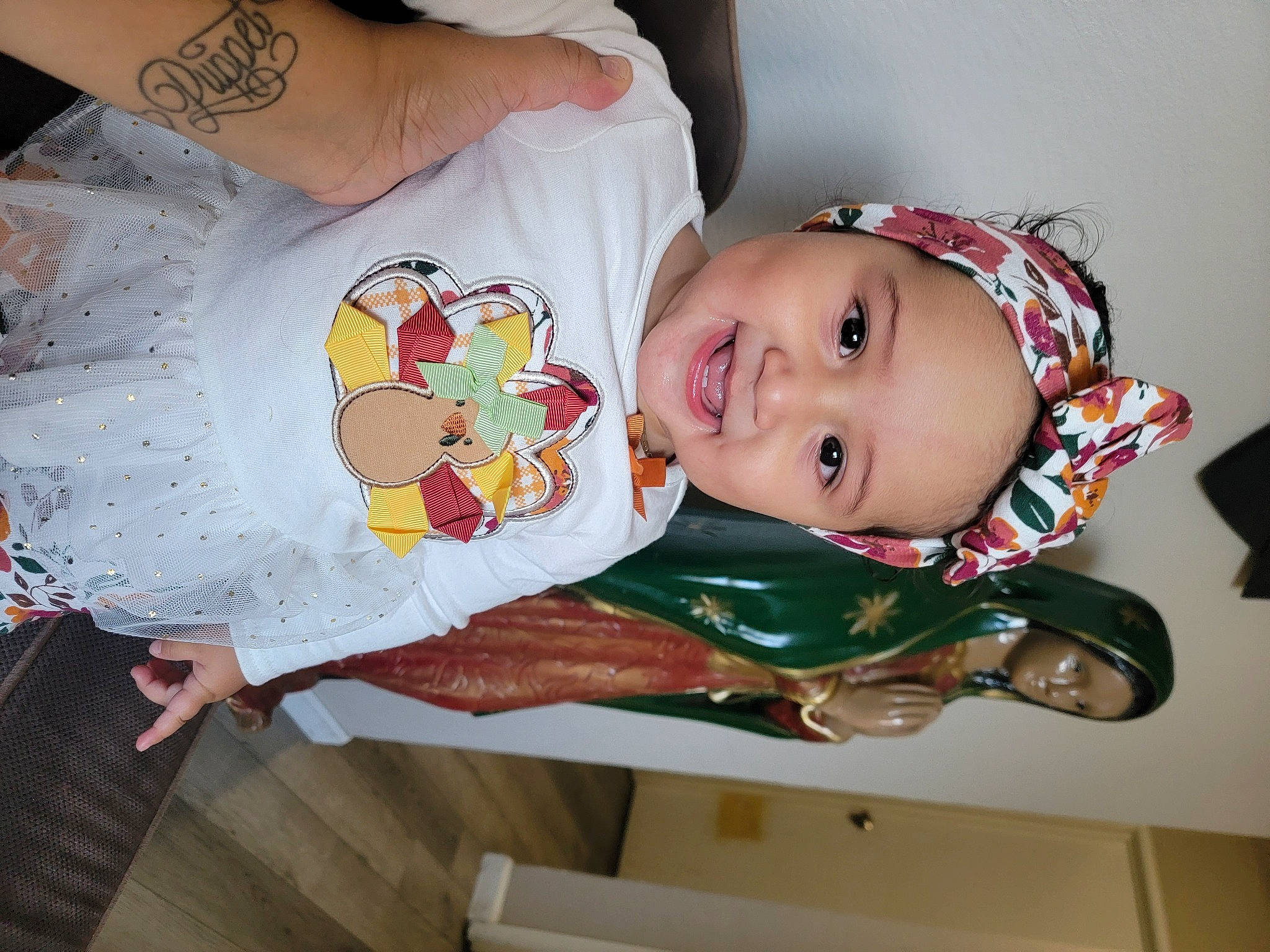 Paola is registered to the contest to win money with this photo: baby, baby_products, baby_toddler_clothing, child, happy, headwear, joy, person, room, sleeve, smile, toddler