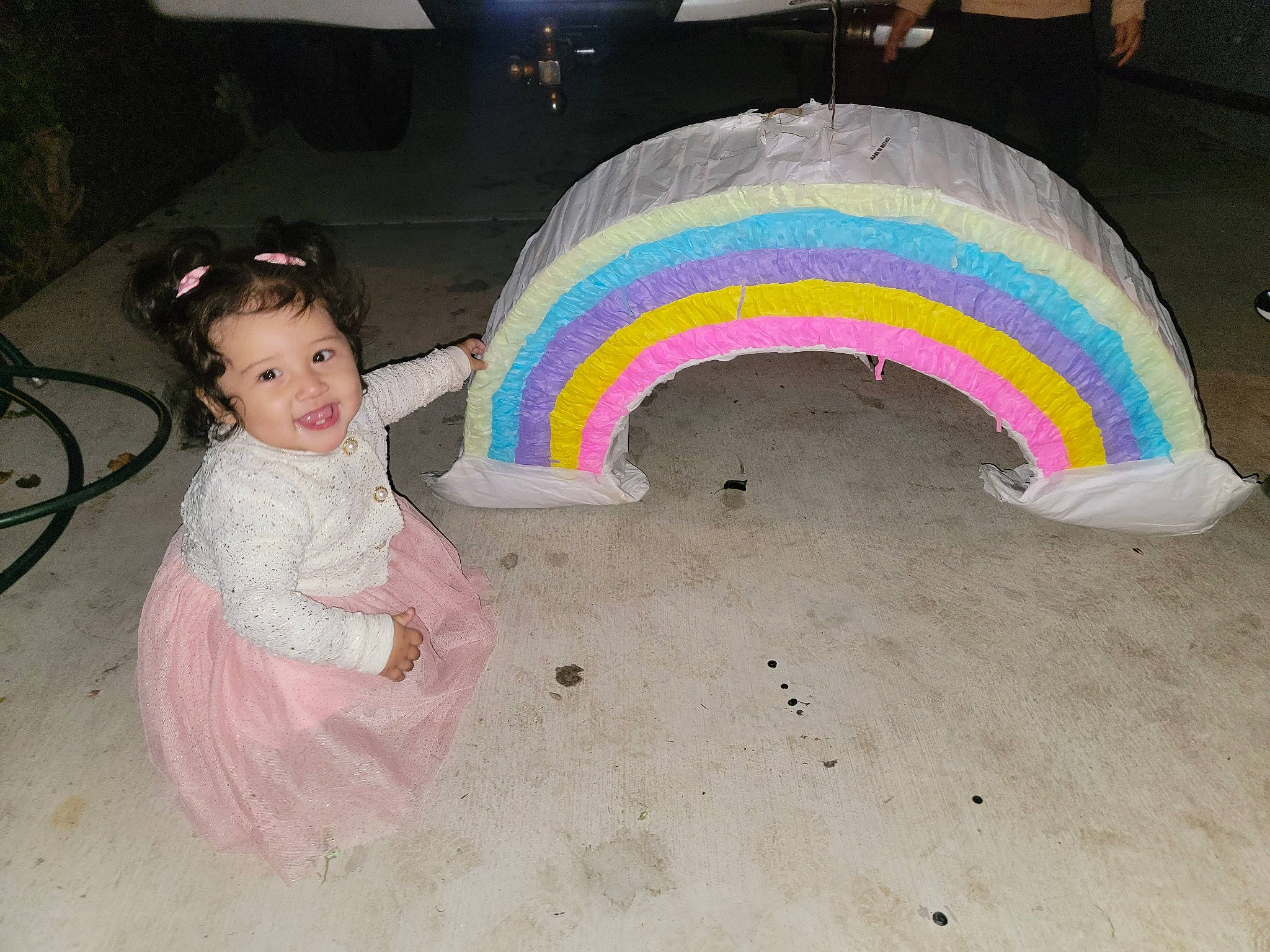 Paola joined the competition — help win amazing prizes! art, automotive_wheel_system, baby, baby_toddler_clothing, child, circle, event, fashion_accessory, fun, happy, joy, magenta, party_supply, person, pink, play, rainbow, smile, textile, toddler