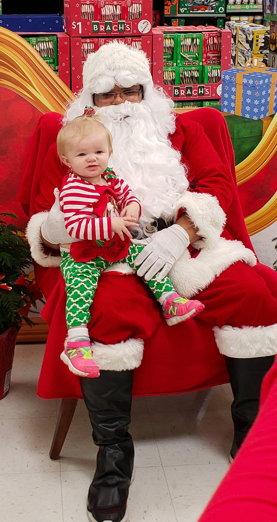 Abigail joined the competition — help win amazing prizes! child, christmas, christmas_eve, christmas_stocking, event, fictional_character, holiday, human_body, lap, person, santa_claus, toddler, tradition