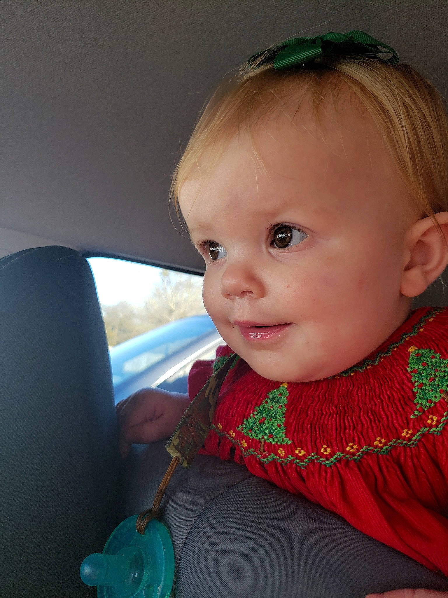 Abigail is registered to the contest to win money with this photo: baby, cheek, child, chin, ear, eye, face, fashion_accessory, forehead, green, head, iris, lip, mouth, neck, nose, outerwear, person, skin, toddler