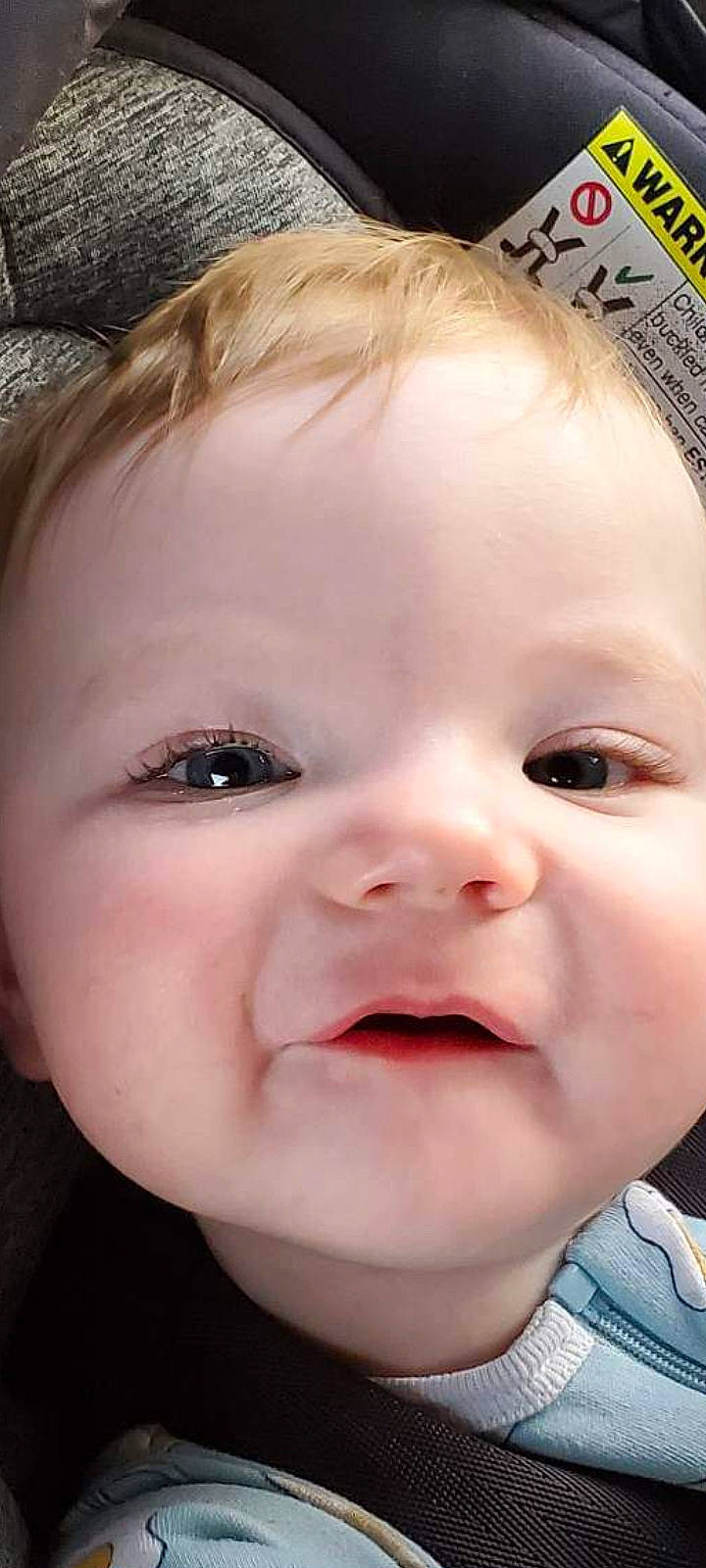 Dwayne is registered to the contest to win money with this photo: baby, baby_toddler_clothing, cheek, child, close_up, ear, eyebrow, eyelash, flash_photography, forehead, grass, happy, iris, lip, mouth, no_expression, nose, person, skin, smile