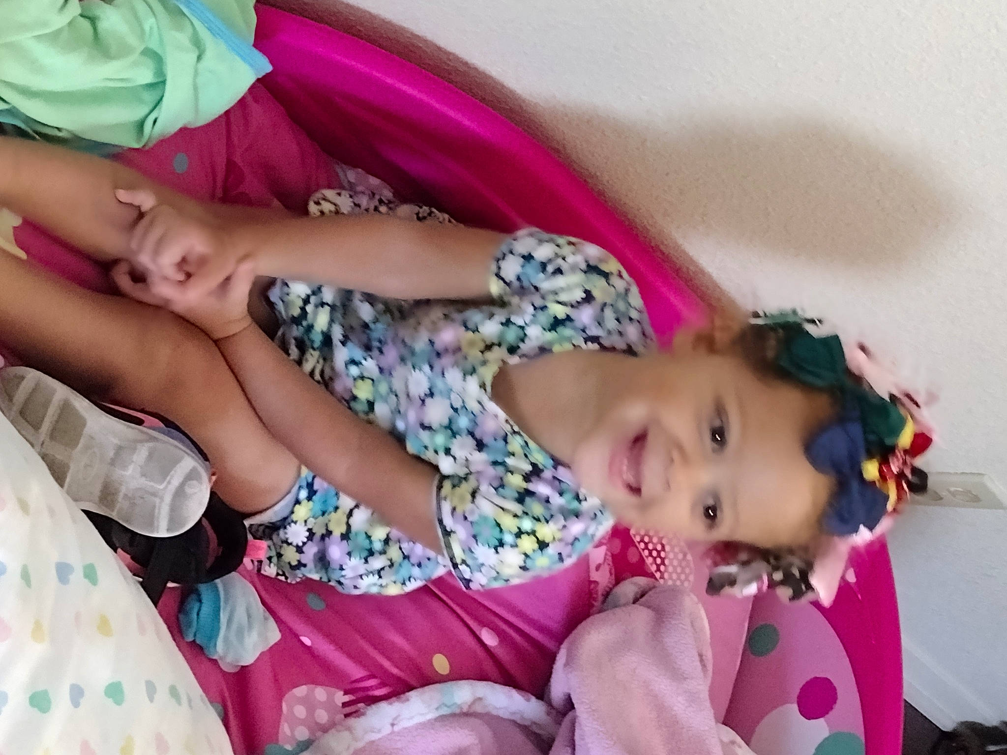 De'Winter is registered to the contest to win money with this photo: arm, baby, baby_toddler_clothing, beauty, child, comfort, event, eyelash, fashion_accessory, happy, joy, magenta, nail, pattern, person, pink, purple, skin, textile, thigh