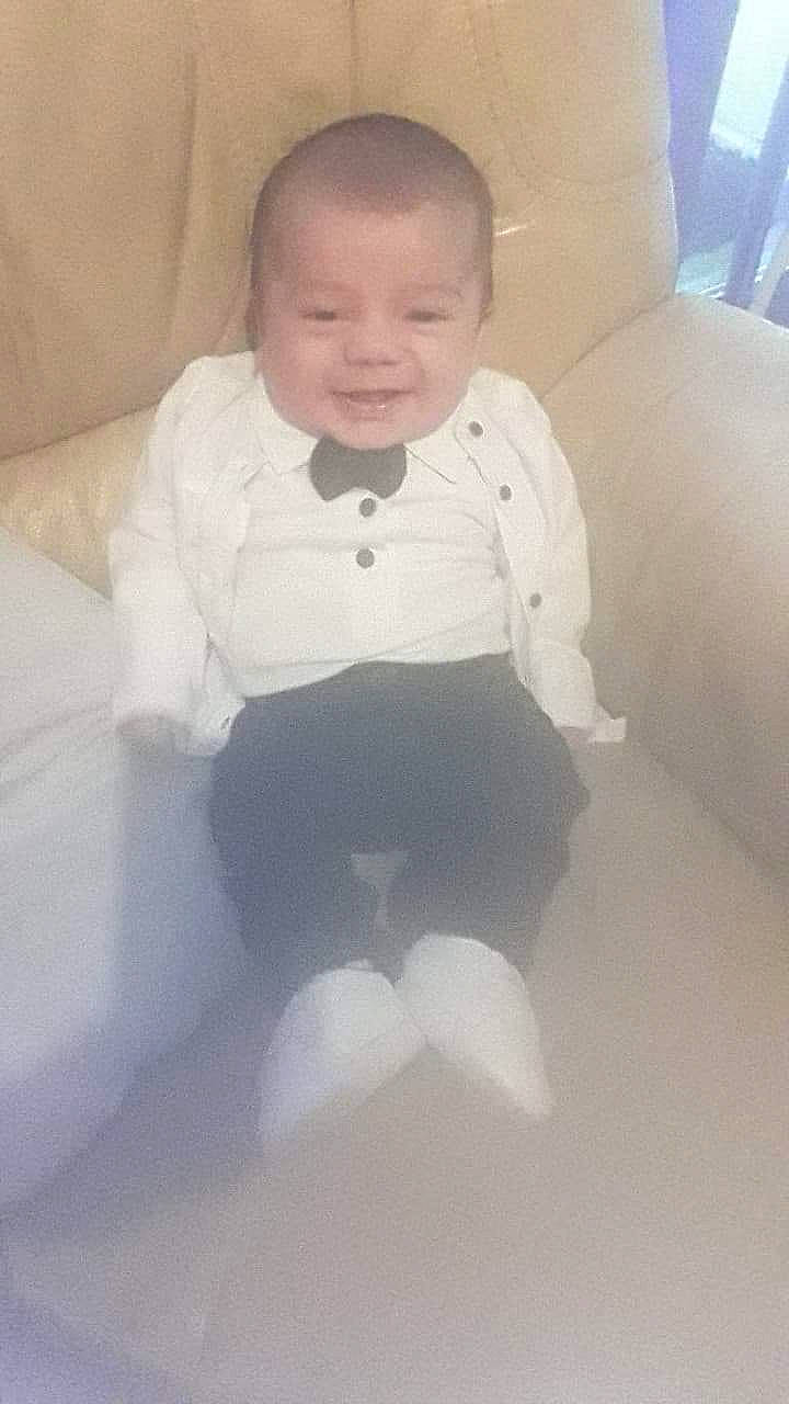 Hamidullah participe au concours pour gagner de l'argent avec cette photo : baby, baby_products, baby_toddler_clothing, cheek, child, comfort, eye, eyebrow, flooring, hair, happy, human_body, joy, knee, linens, person, room, sleeve, smile, t_shirt