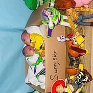 Noah Et Noam participe au concours pour gagner de l'argent avec cette photo : baby, buzz_lightyear, cardboard_box, child, colorful, costume, cute, floor, forky, fun, indoor, jessie, nap, playroom, rex_dinosaur, sleeping, slinky_dog, toy_story, toys, woody