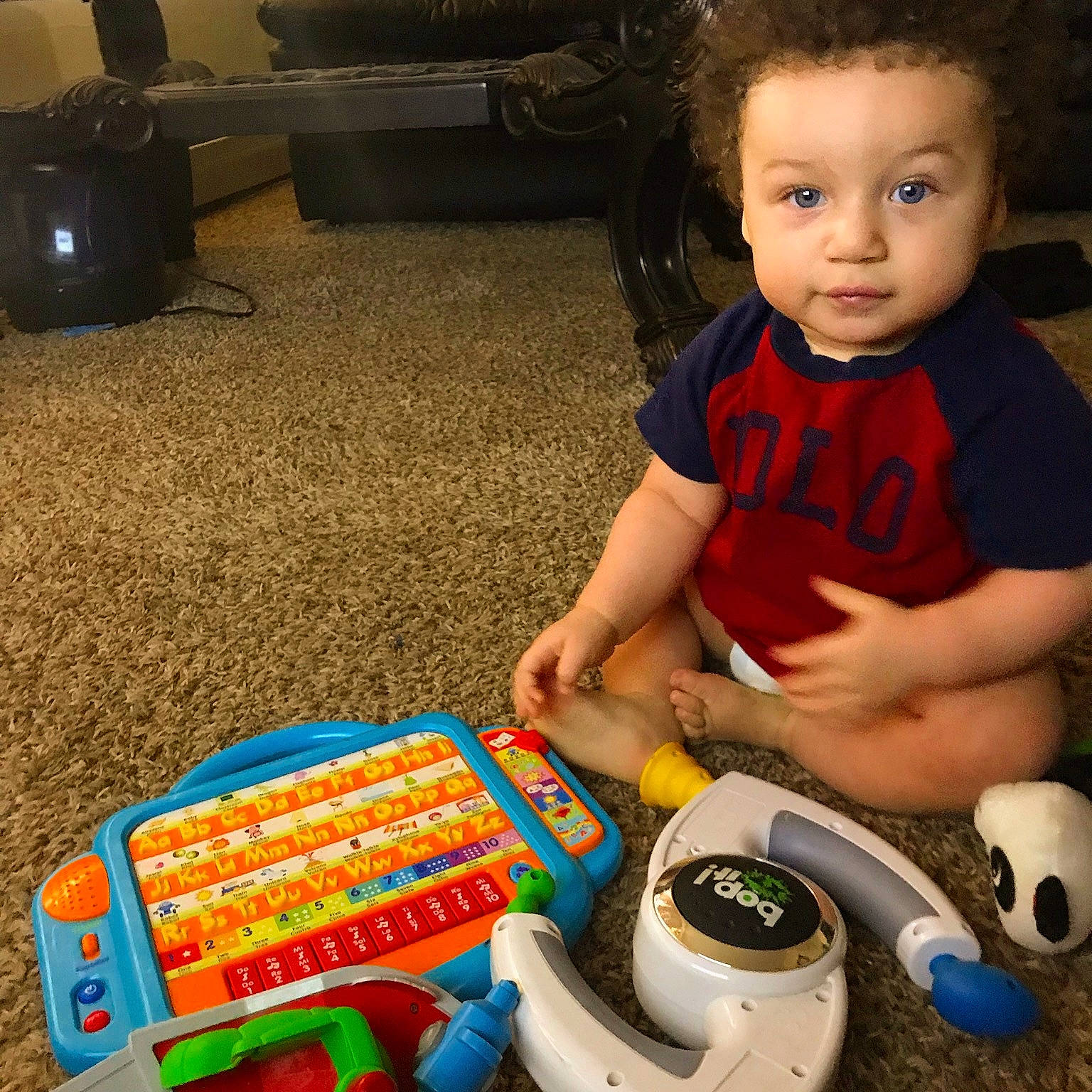 Titus is registered to the contest to win money with this photo: child, person, play, playset, toddler, toy