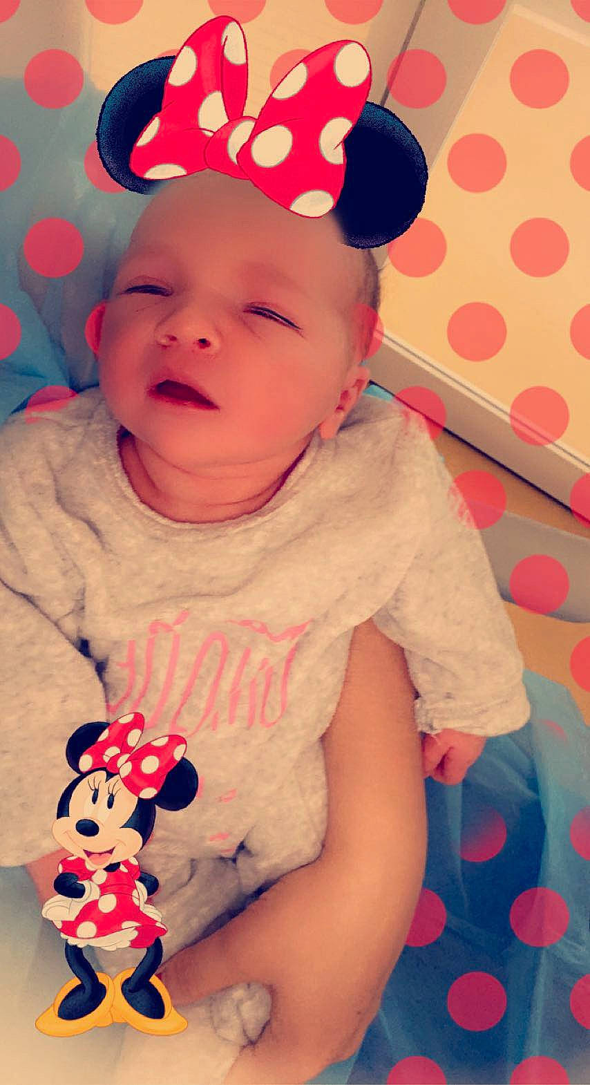 Mélyssa participe au concours pour gagner de l'argent avec cette photo : baby, baby_toddler_clothing, cap, cheek, child, face, fun, happy, headwear, lip, magenta, pattern, person, pink, red, skin, sleeve, smile, t_shirt, textile