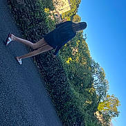 Tokyo participe au concours pour gagner de l'argent avec cette photo : asphalt, azure, dress, electric_blue, fun, grass, happy, human_leg, landscape, leisure, people_in_nature, plant, recreation, rock, shadow, sky, slope, sunlight, tree, water