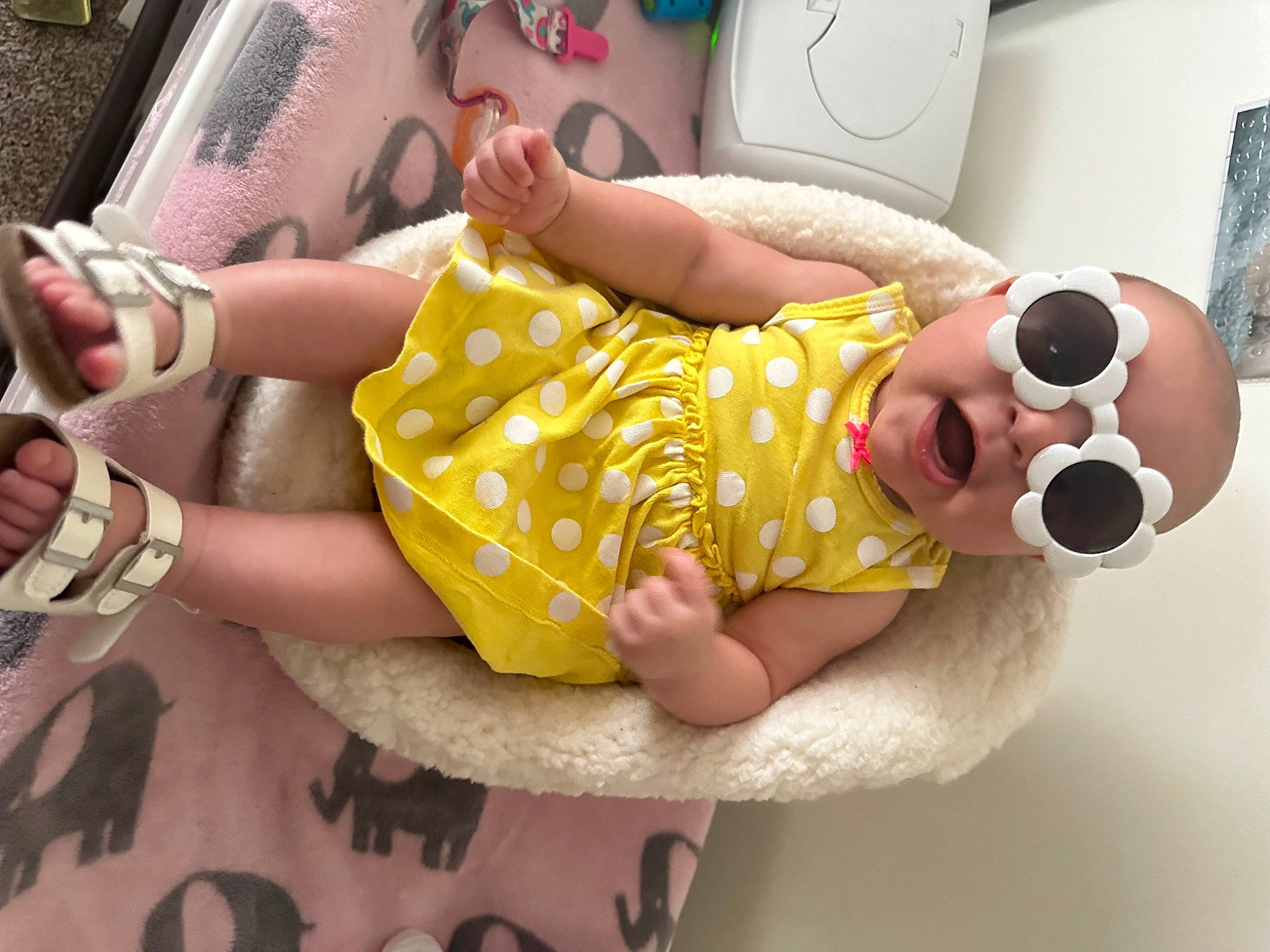Zaylin Grace joined the competition — help win amazing prizes! baby, baby_safety, baby_toddler_clothing, child, comfort, eyewear, finger, foot, glasses, goggles, hand, happy, human_leg, nail, person, pink, skin, sunglasses, thigh, thumb
