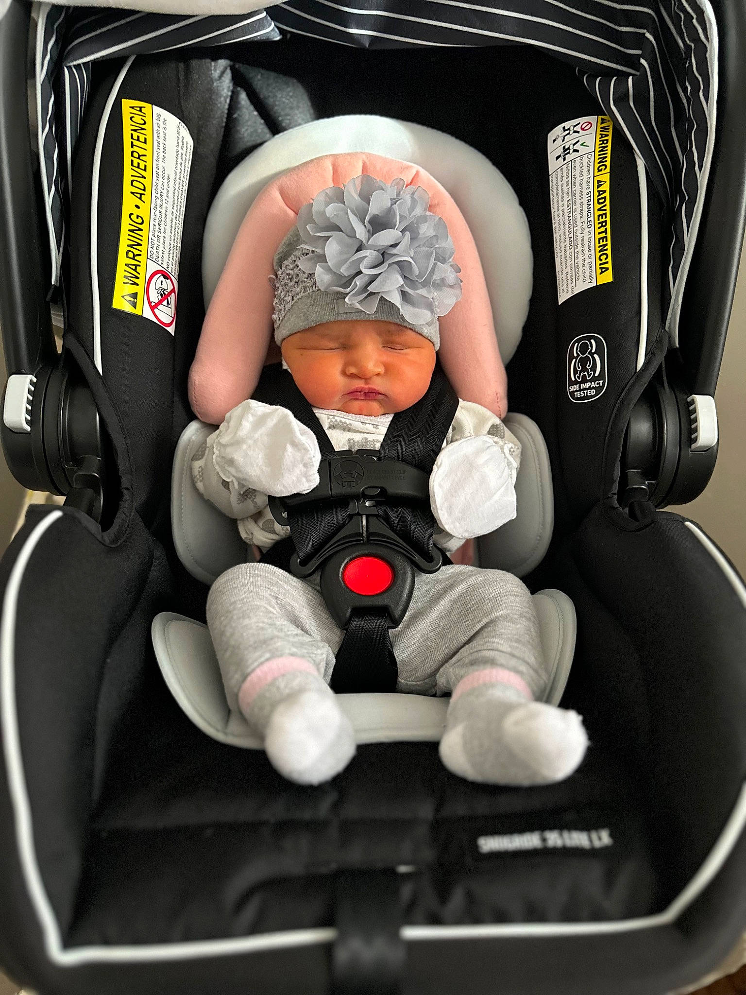 Zaylin is registered to the contest to win money with this photo: auto_part, automotive_design, baby, baby_carriage, baby_in_car_seat, baby_products, baby_safety, baby_sleeping, baby_toddler_clothing, car_seat, child, comfort, headwear, lap, material_property, mode_of_transport, motor_vehicle, person, service, sitting