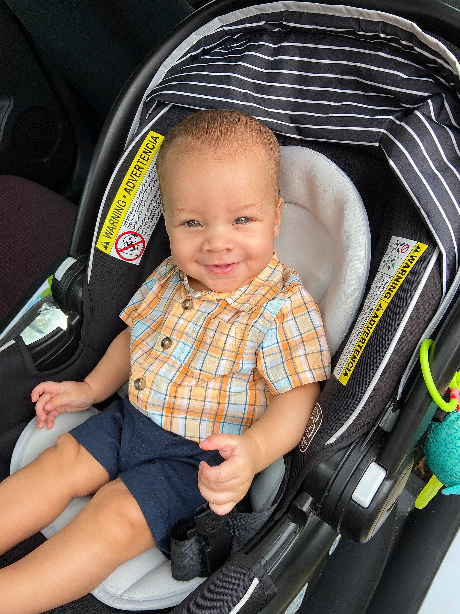 Mekhi is registered to the contest to win money with this photo: auto_part, automotive_design, baby, baby_carriage, baby_products, baby_toddler_clothing, beauty, car_seat, child, comfort, family_car, fun, joy, motor_vehicle, person, personal_luxury_car, shorts, sitting, smile, steering_wheel