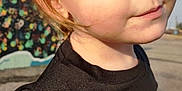 Hope joined the competition — help win amazing prizes! child, toddler, face, portrait, outdoor, sunlight, nike, black_shirt, curious, smirk, young, person, casual_clothing, daylight, mural, background, blonde_hair, blue_eyes, closeup, expression