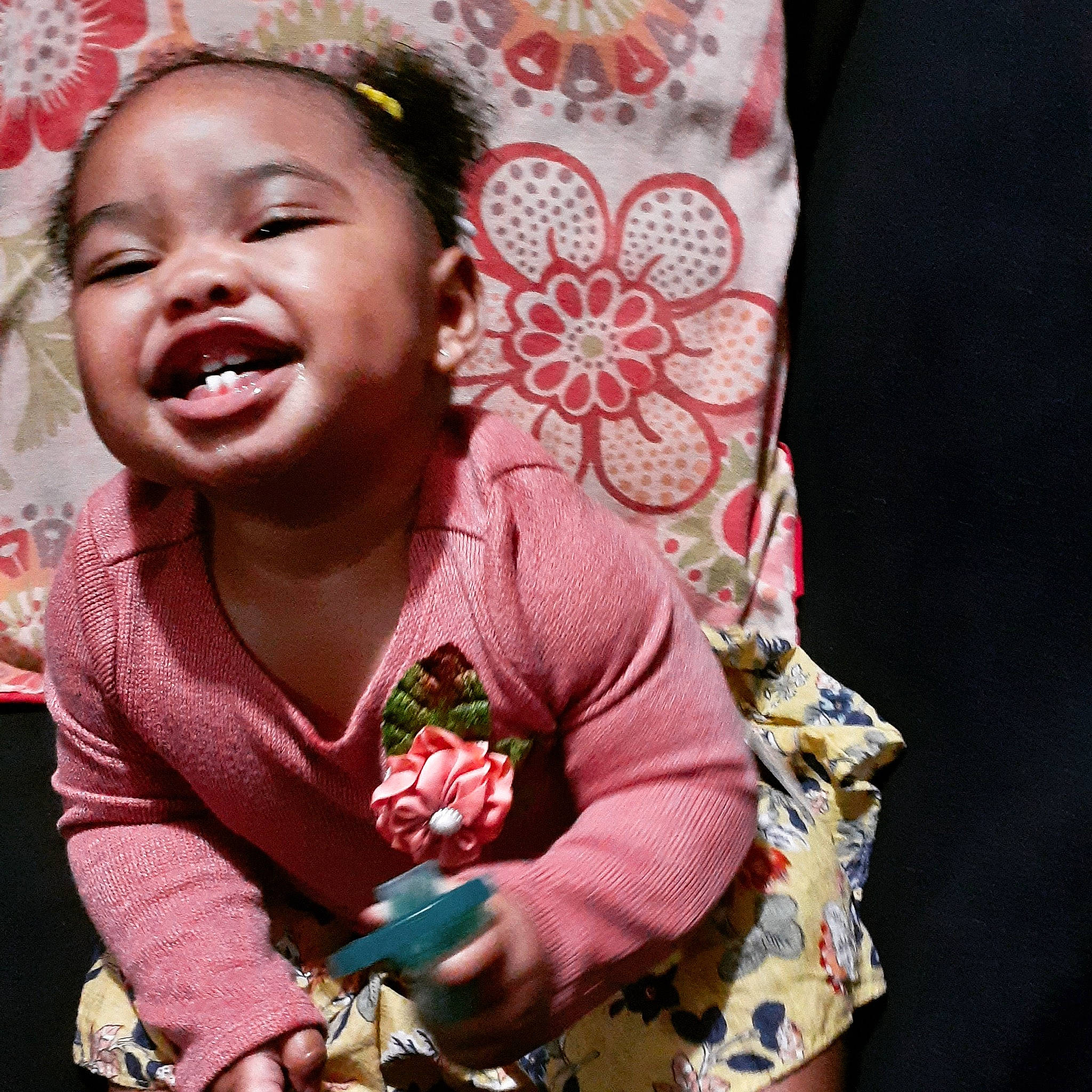 Khalie is registered to the contest to win money with this photo: baby, cheek, child, facial_expression, fun, happy, laugh, mouth, nose, person, pink, play, smile, toddler, tooth