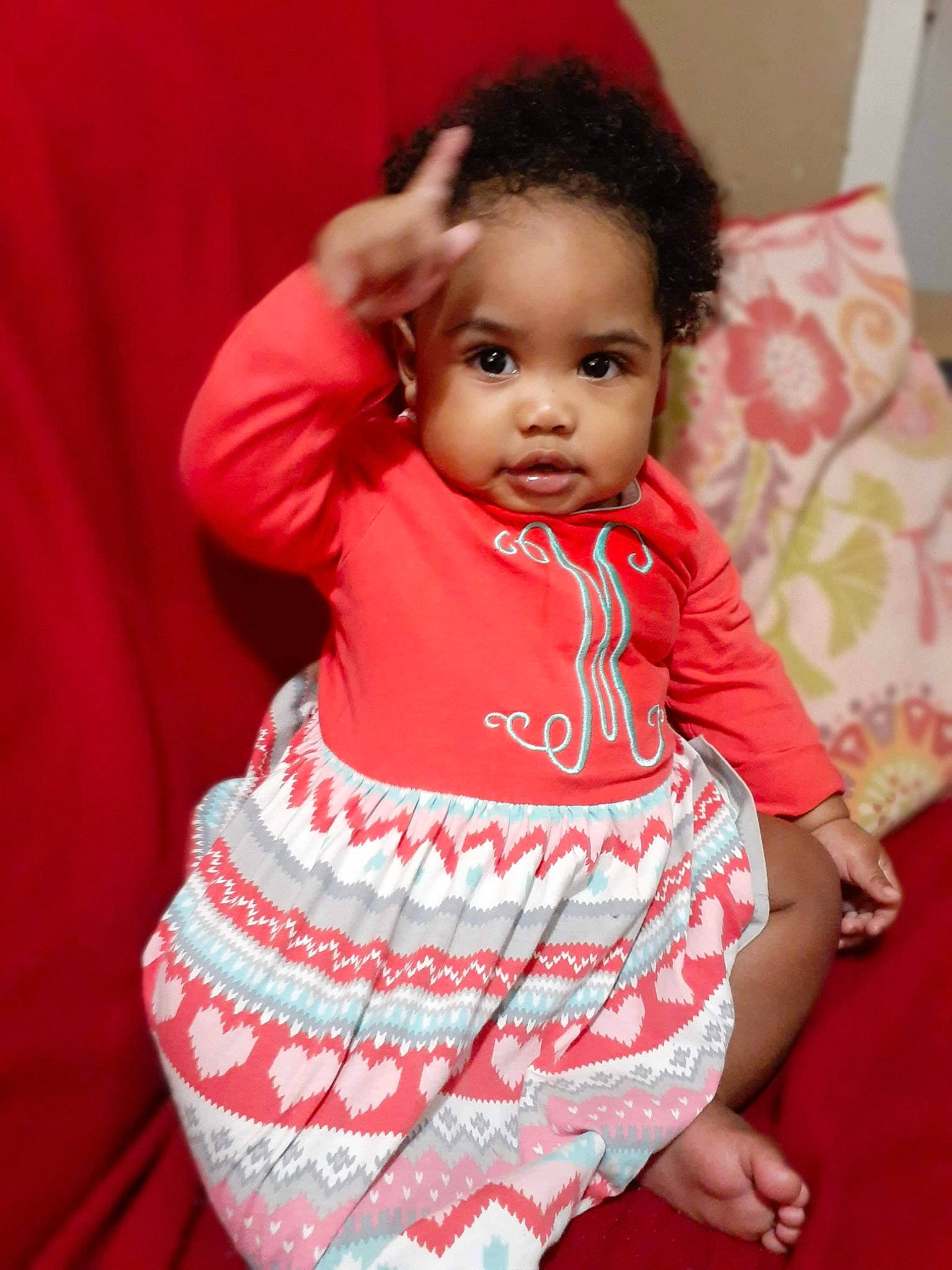 Khalie is registered to the contest to win money with this photo: baby, baby_toddler_clothing, beauty, cheek, child, child_model, face, head, person, pink, red, sitting, skin, smile, toddler