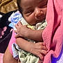 Caspain is registered to the contest to win money with this photo: baby, blanket, bodypart, bonnet, clothing, face, finger, furniture, hand, happy, hat, head, newborn, person, photography, portrait, quilt, sleeping, smile, towel