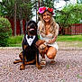 Nerone a rejoint le concours — aidez-le/la à gagner de superbes lots ! rottweiler, dog, woman, flower_crown, white_dress, tattoo, outdoor, grass, trees, gravel, smile, pet, nature, summer, fence, happy, portrait, animal, fashion, friendship
