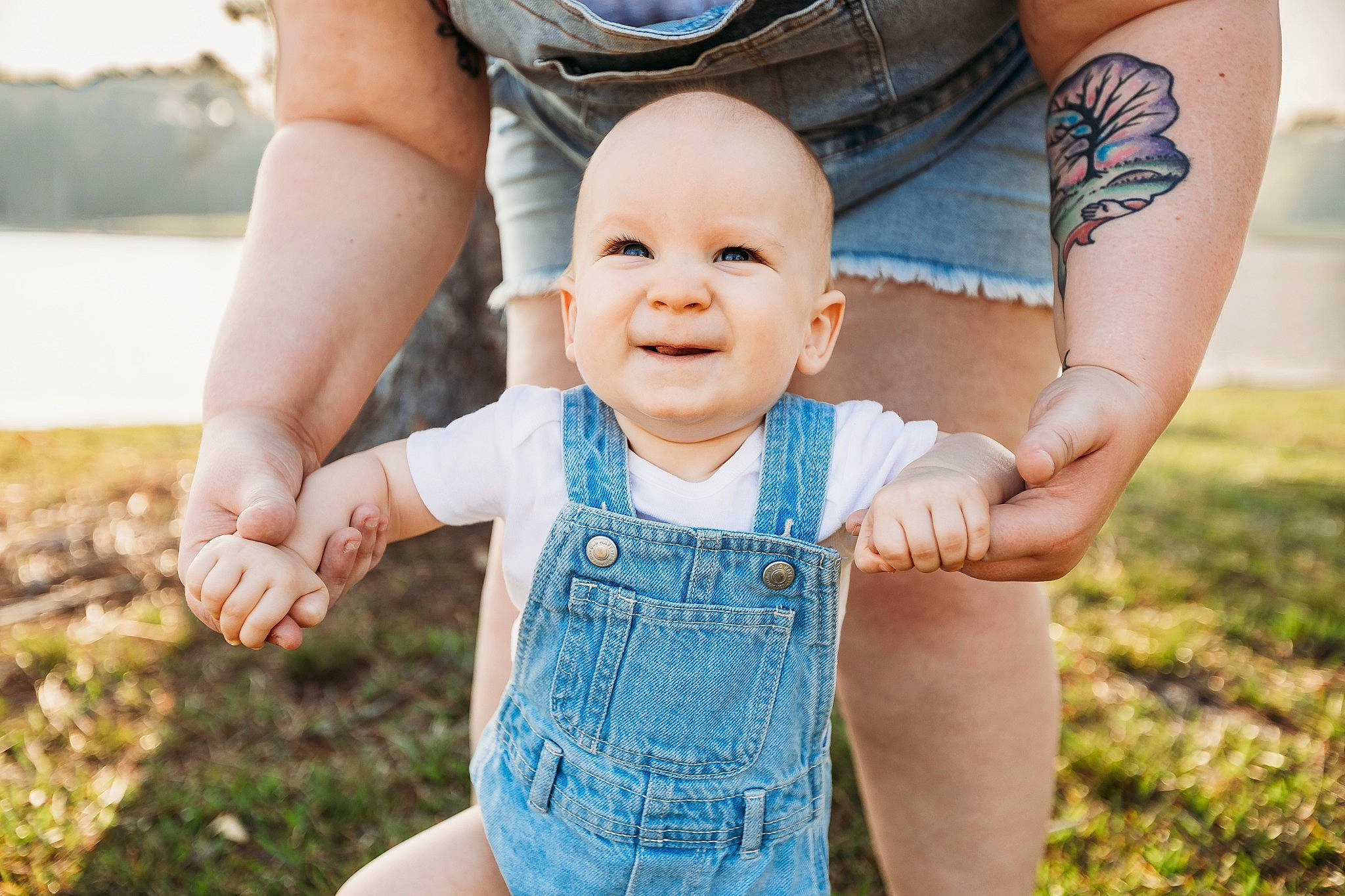 Harry is registered to the contest to win money with this photo: arm, azure, baby_toddler_clothing, dress, eye, facial_expression, finger, flash_photography, gesture, hand, happy, head, joy, leaf, people_in_nature, person, photograph, plant, skin, smile