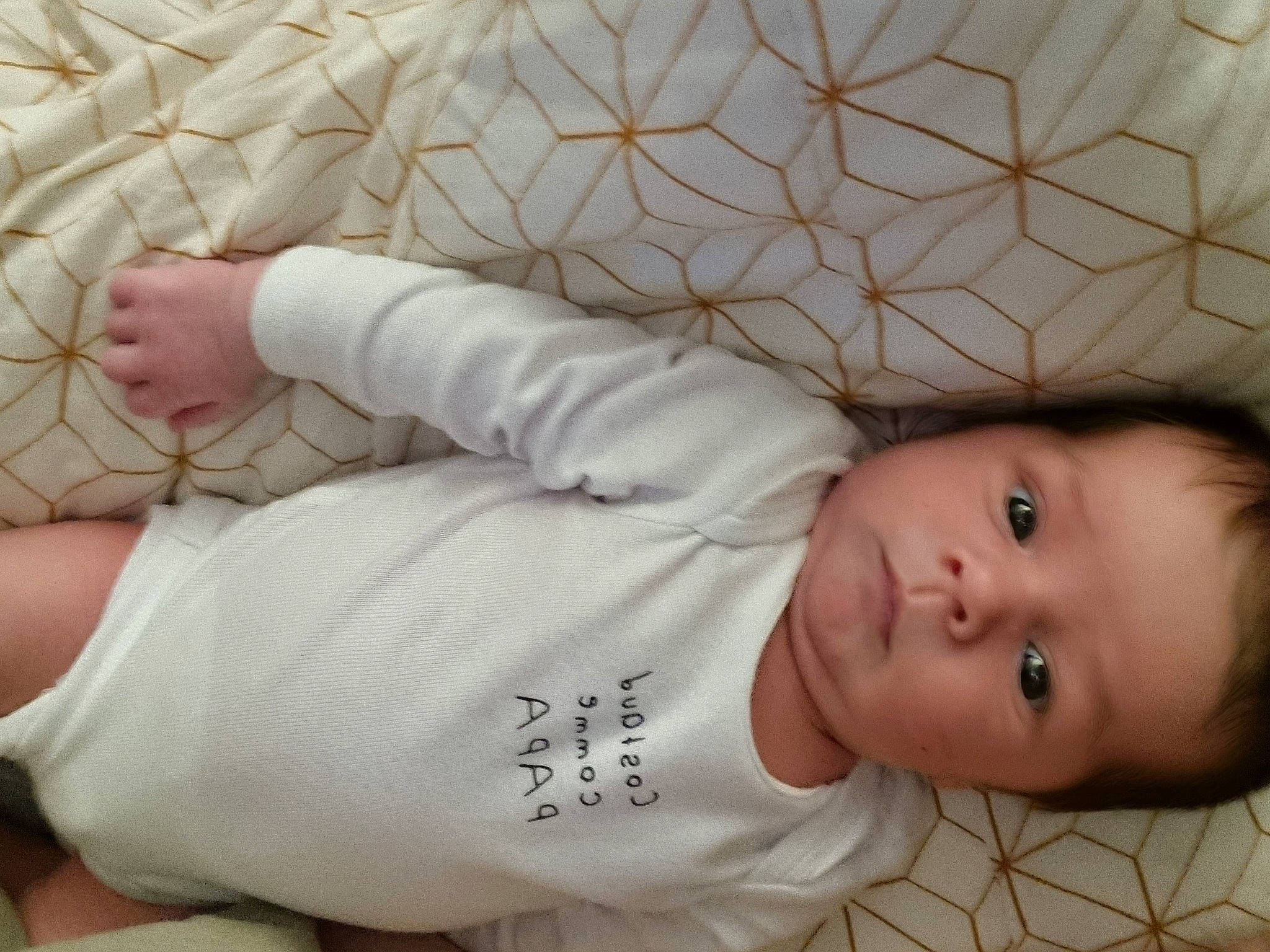 Leo participe au concours pour gagner de l'argent avec cette photo : baby, baby_sleeping, baby_toddler_clothing, cheek, child, comfort, finger, gesture, hair, head, human, human_body, mouth, nose, person, skin, sleeve, textile, toddler, white