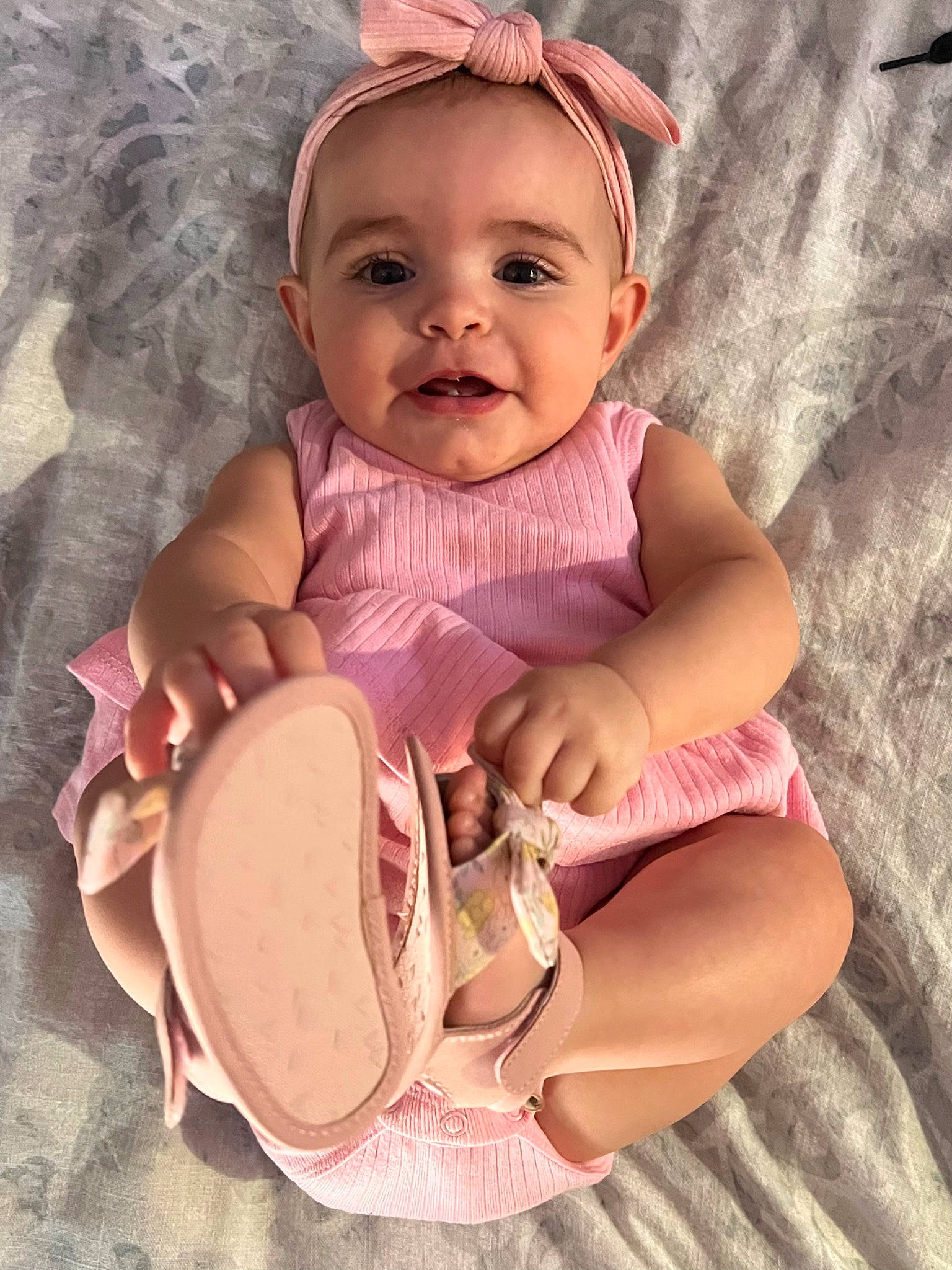 Priva is registered to the contest to win money with this photo: baby, baby_products, baby_toddler_clothing, cheek, child, eye, eyelash, face, fashion_accessory, finger, happy, headgear, neck, peach, person, pink, skin, sleeve, smile, thumb