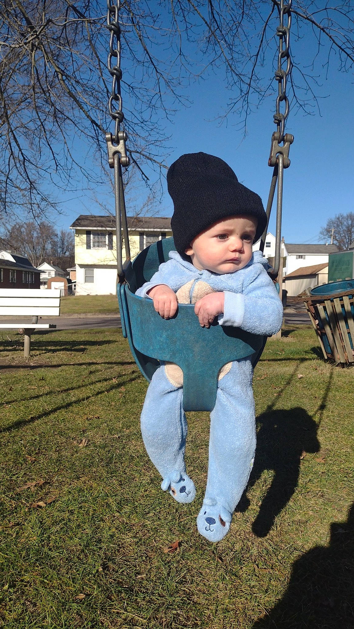 Jensen joined the competition — help win amazing prizes! baby, cap, child, city, electric_blue, fun, grass, happy, hat, headwear, leisure, person, plant, recreation, sitting, sky, spring, sun_hat, swing, toddler