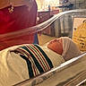 newborn, baby, hospital, bassinet, blanket, sleeping, infant, person, bed, hat, hand, indoor, medical, nursery, care, portrait, rest, wrapped, peaceful, newborn_bassinet