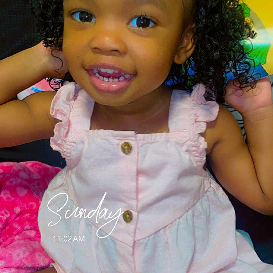 Bella joined the competition — help win amazing prizes! accessories, baby, babylaughing, bodypart, clothing, dress, face, hair, happy, head, jewelry, laughing, mouth, person, photography, portrait, shorts, sitting, smile, teeth