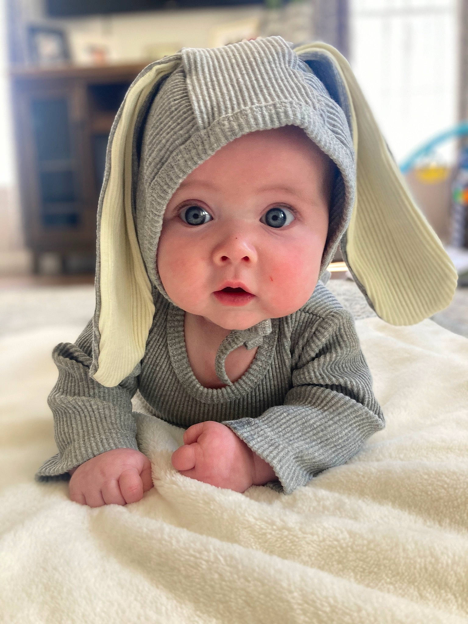 Judson is registered to the contest to win money with this photo: baby, baby_products, baby_safety, baby_toddler_clothing, beanie, cap, cheek, child, comfort, fashion_accessory, headgear, headwear, knit_cap, linens, person, portrait_photography, product, shelf, skin, sleeve