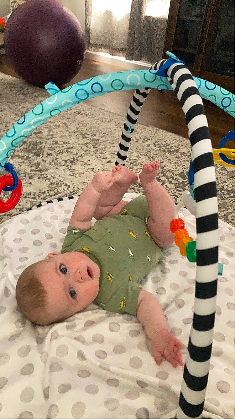 Judson joined the competition — help win amazing prizes! baby, baby_products, baby_toddler_clothing, bracelet, child, comfort, fashion_accessory, foot, fun, human_body, jewellery, leisure, linens, pattern, person, play, room, sitting, toddler, toy