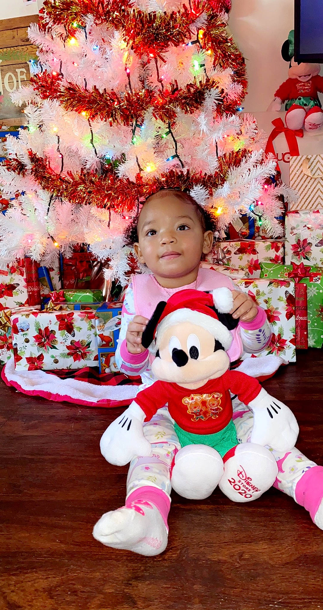 Tamiko is registered to the contest to win money with this photo: baby_products, baby_toddler_clothing, baby_toys, christmas, christmas_decoration, fur, holiday, interior_design, ornament, party_supply, person, pink, plush, sock, stuffed_toy, teddy_bear, textile, toy