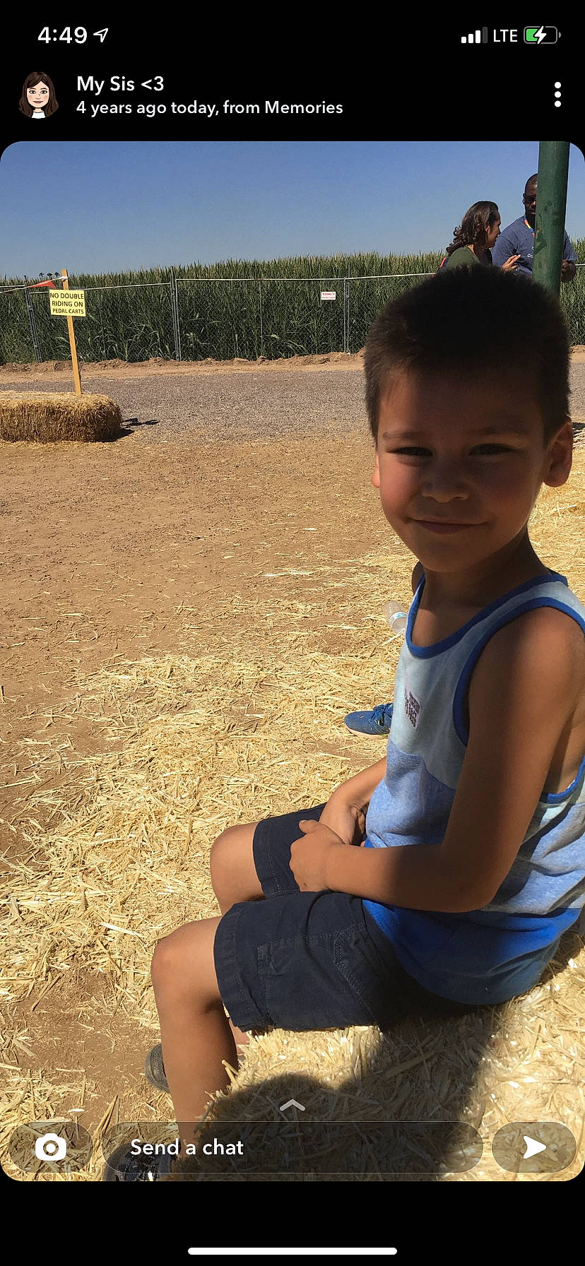 Luis is registered to the contest to win money with this photo: chin, cool, fun, grass, grass_family, happy, joy, leisure, light, neck, people_in_nature, person, plant, sand, skin, sky, summer, sunlight, thigh, toddler